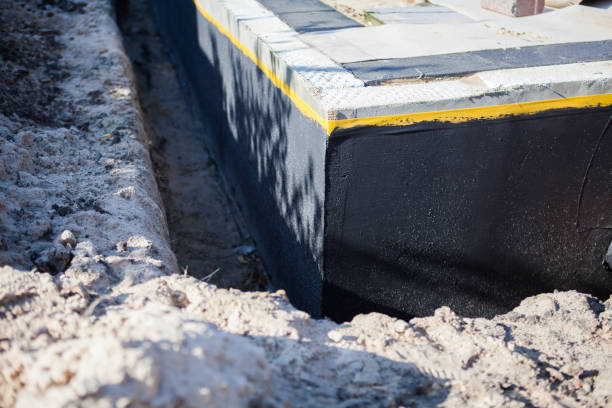 Professional Waterproofing technician working in Strawberry Plains, TN